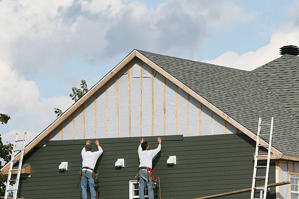 Professional Siding Contractor technician working in Williamsburg, VA